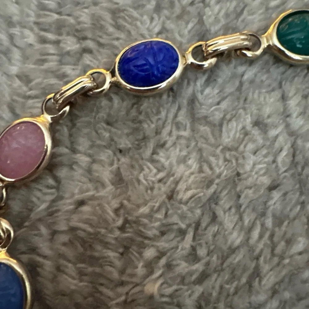 EUC multi stone gold tone bracelet